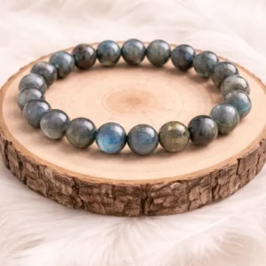 Bracelet labradorite en pierres naturelles sur rondin en bois