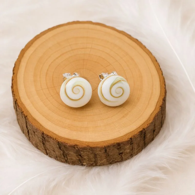 boucles d’oreilles oeil de sainte lucie shiva sur rondin bois