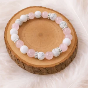 Bracelet quartz rose howlite sur rondin en bois avec plumes