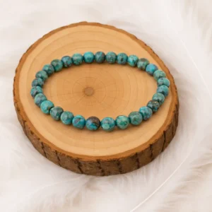 Bracelet turquoise d’Afrique 6 mm en pierres naturelles sur rondin en bois