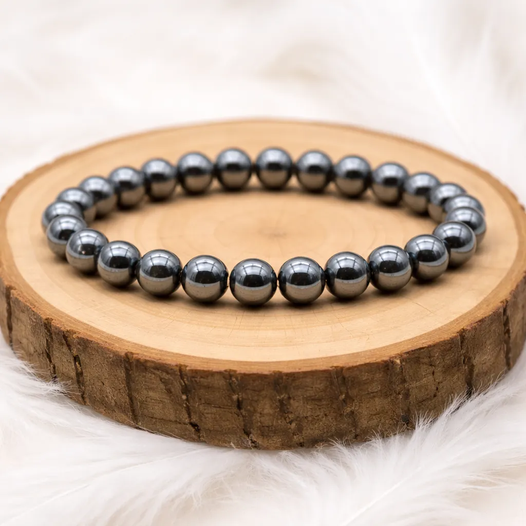 Bracelet hématite naturelle perles rondes sur rondin en bois