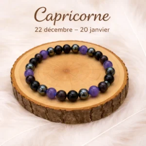 bracelet capricorne pierres naturelles onyx hématite améthyste grenat sur rondin bois
