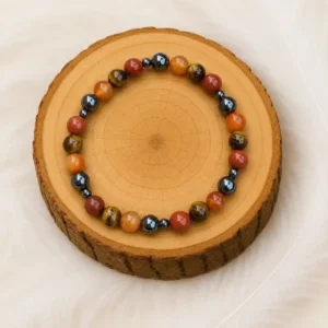 bracelet pierres pour le sport sur rondin en bois