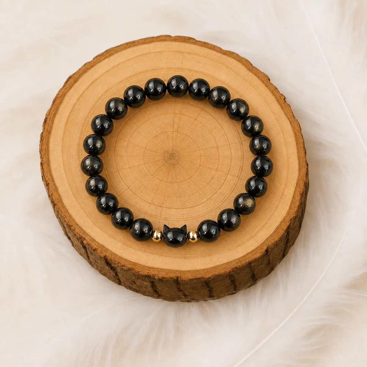 Bracelet en obsidienne dorée 8 mm avec perle tête de chat sur rondin